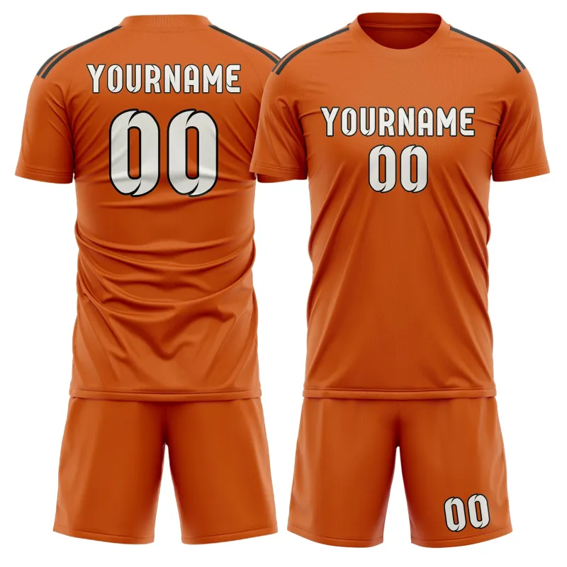 Custom Orange White Soccer Set made by Tailorly