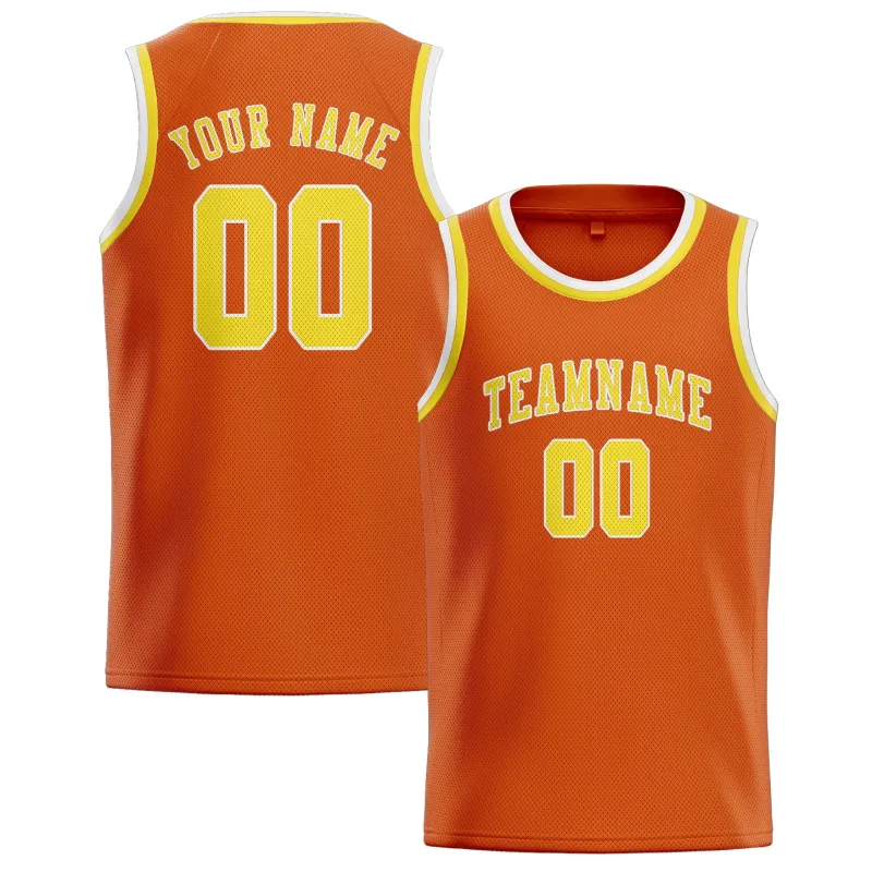 Custom Orange Light Yellow Basketball Jersey made by Tailorly