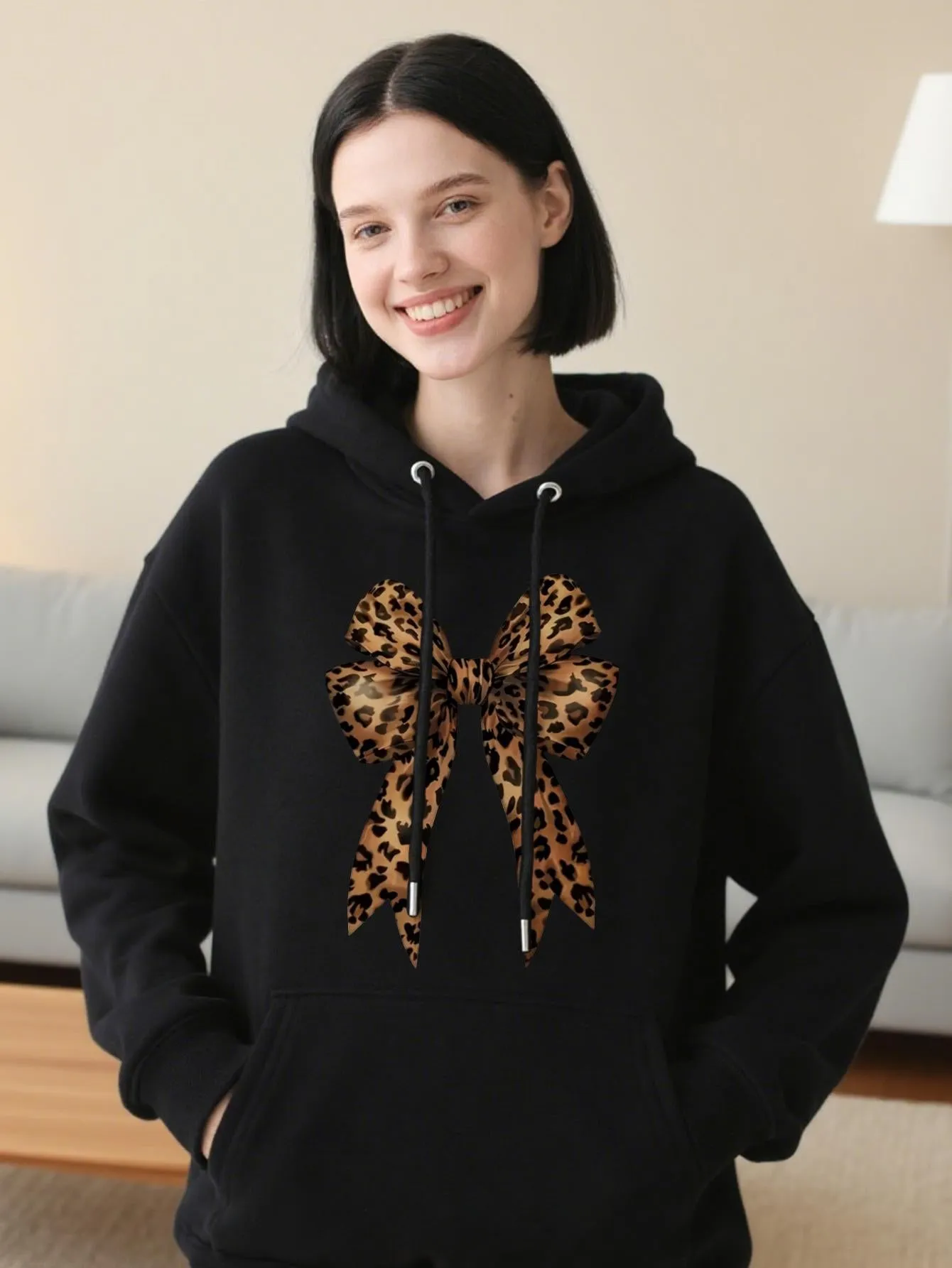 Tailorly Women's Printed Hoodie - Leopard Print Ribbon Design On Cozy Relaxing Casual Black Hoodie sold by Tailorly