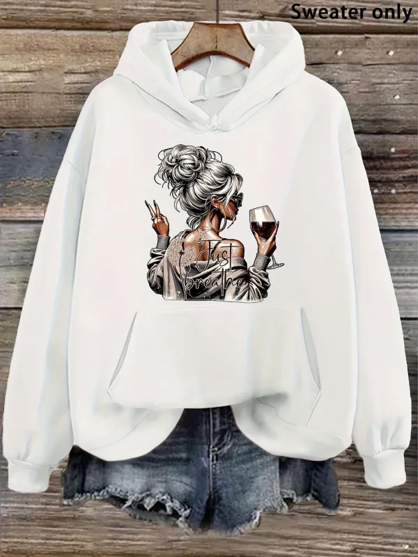Tailorly Women's Printed Hoodie - Stylish Woman With Sunglasses Holding Wine Glass Among Light Hues Hoodie made by Tailorly