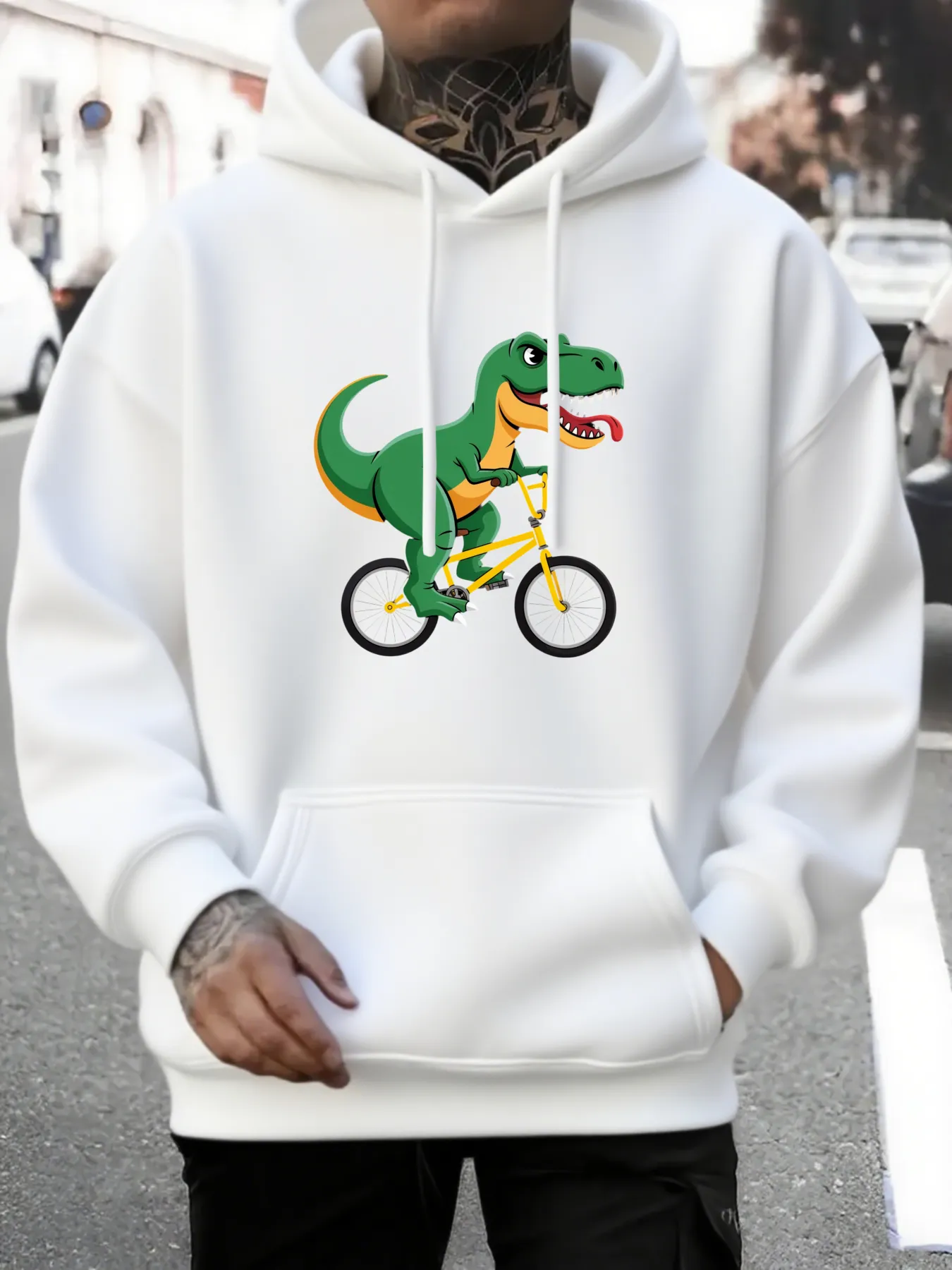 Tailorly Men's Printed Hoodie - Whimsical Green Dinosaur Riding A Yellow Bike Through City Streets Dinosaur sold by Tailorly