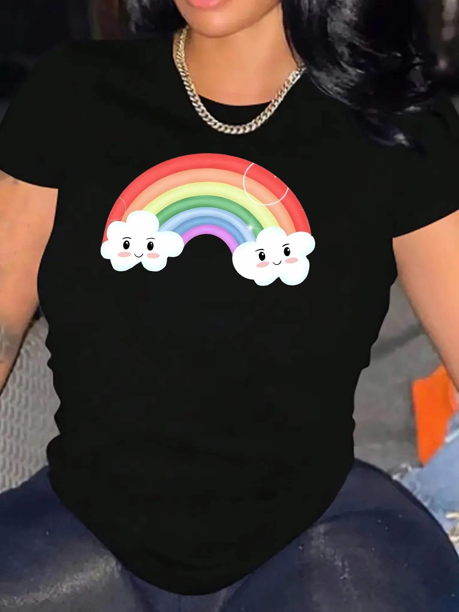 Tailorly Women's Printed Tee - Smiling Cartoon Clouds Under Bold Rainbow Illustration sold by Tailorly