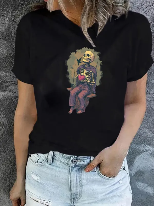 Tailorly Women's Printed Tee - Retro Grunge Style Seated Skeleton Holding Red Heart made by Tailorly