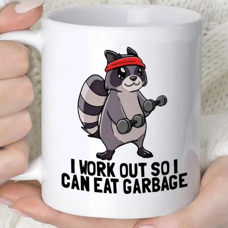 Tailorly White Ceramic 11 oz Mug - I Work Out So I Can Eat Garbage Cartoon Trash Panda Wearing Red Headband Lifting Heavy Black Iron Dumbbells Raccoon made by Tailorly