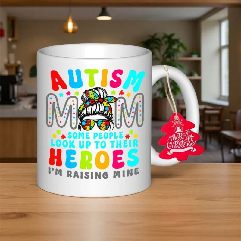 Tailorly White Ceramic 11 oz Mug - Autism Mom Some People Look Up To Their Heroes Im Raising Mine Messy Bun With Puzzle Pattern Headband And Glasses Graphic made by Tailorly