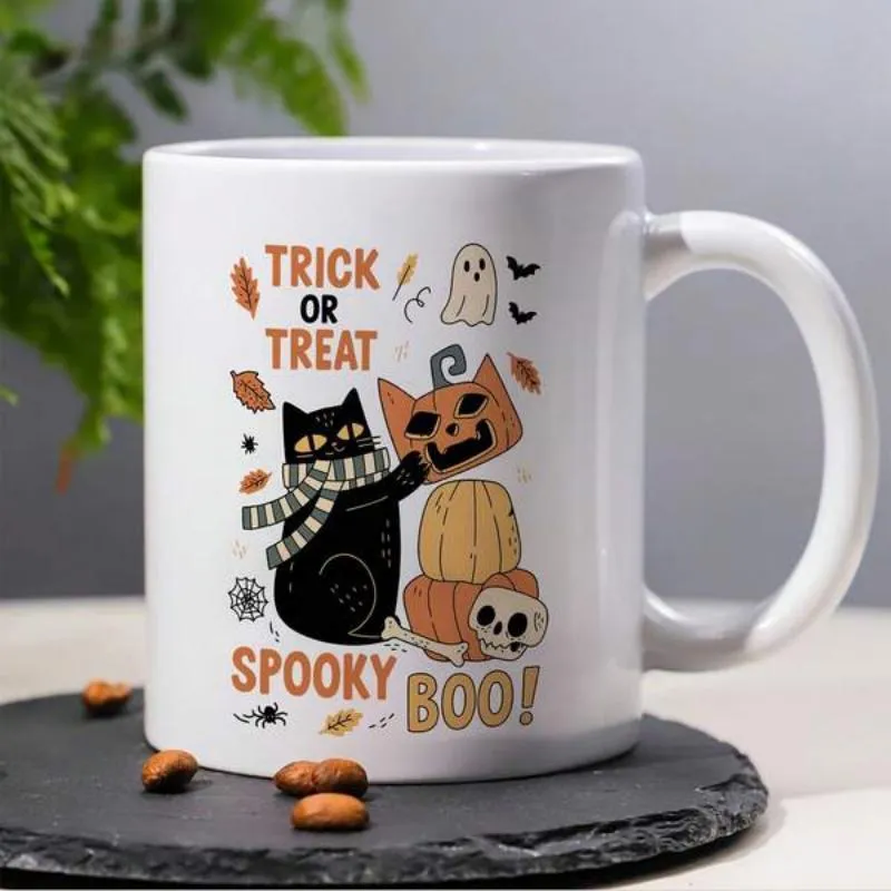 Tailorly White Ceramic 11 oz Mug - Trick Or Treat Spooky Boo Halloween Black Cat Wearing Scarf Beside Stacked Jack O Lanterns Cat made by Tailorly
