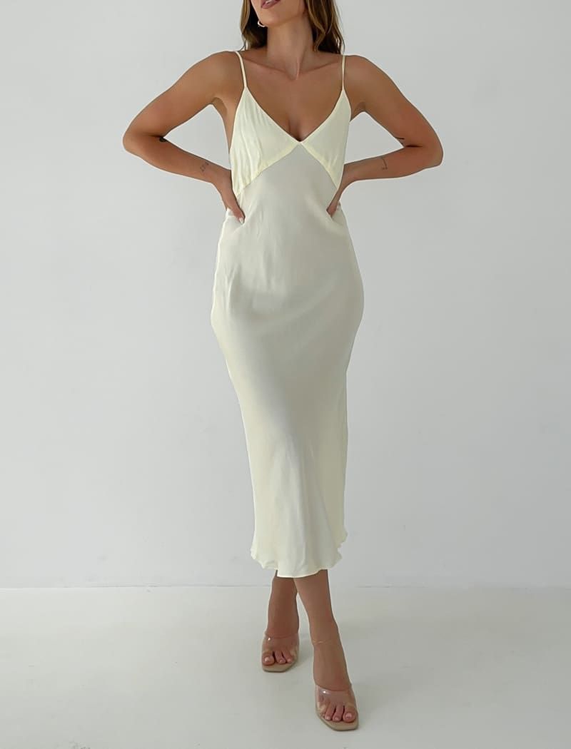 Riviera Midi Dress | Buttermilk sold by Rumored