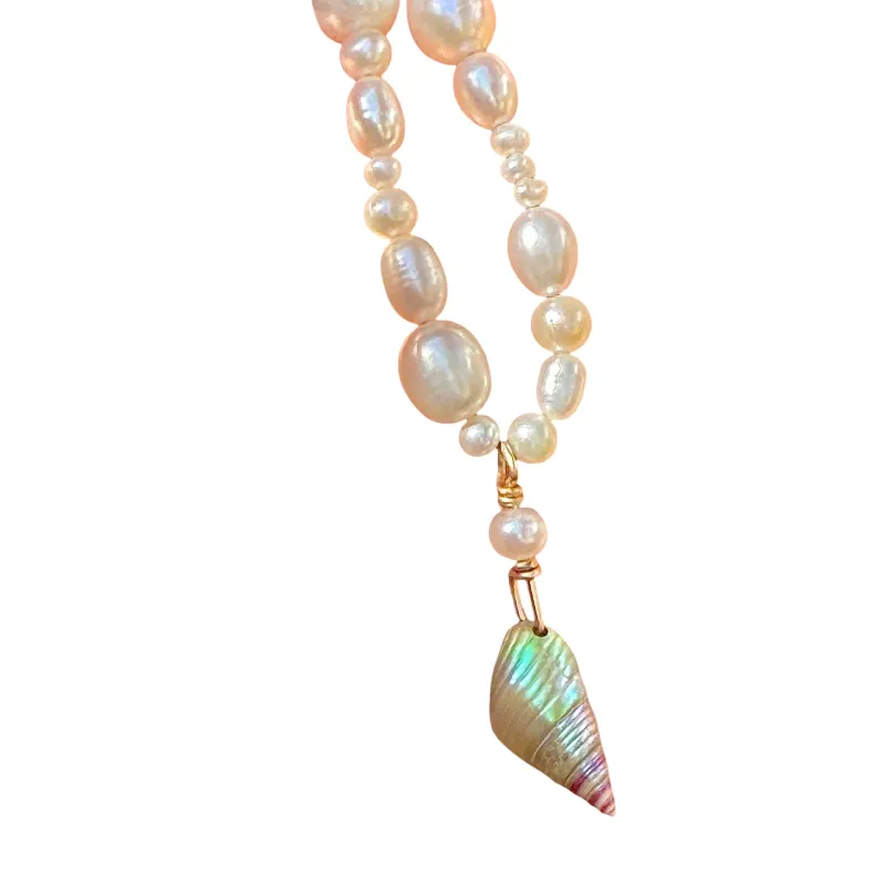 Rainbow kelp shell necklace sold by Ace of Swords