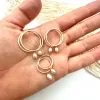 Classic pearl hoops sold by Ace of Swords