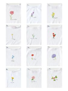 Alex Flower Tee - March Daffodil sold by Lisa Says Gah