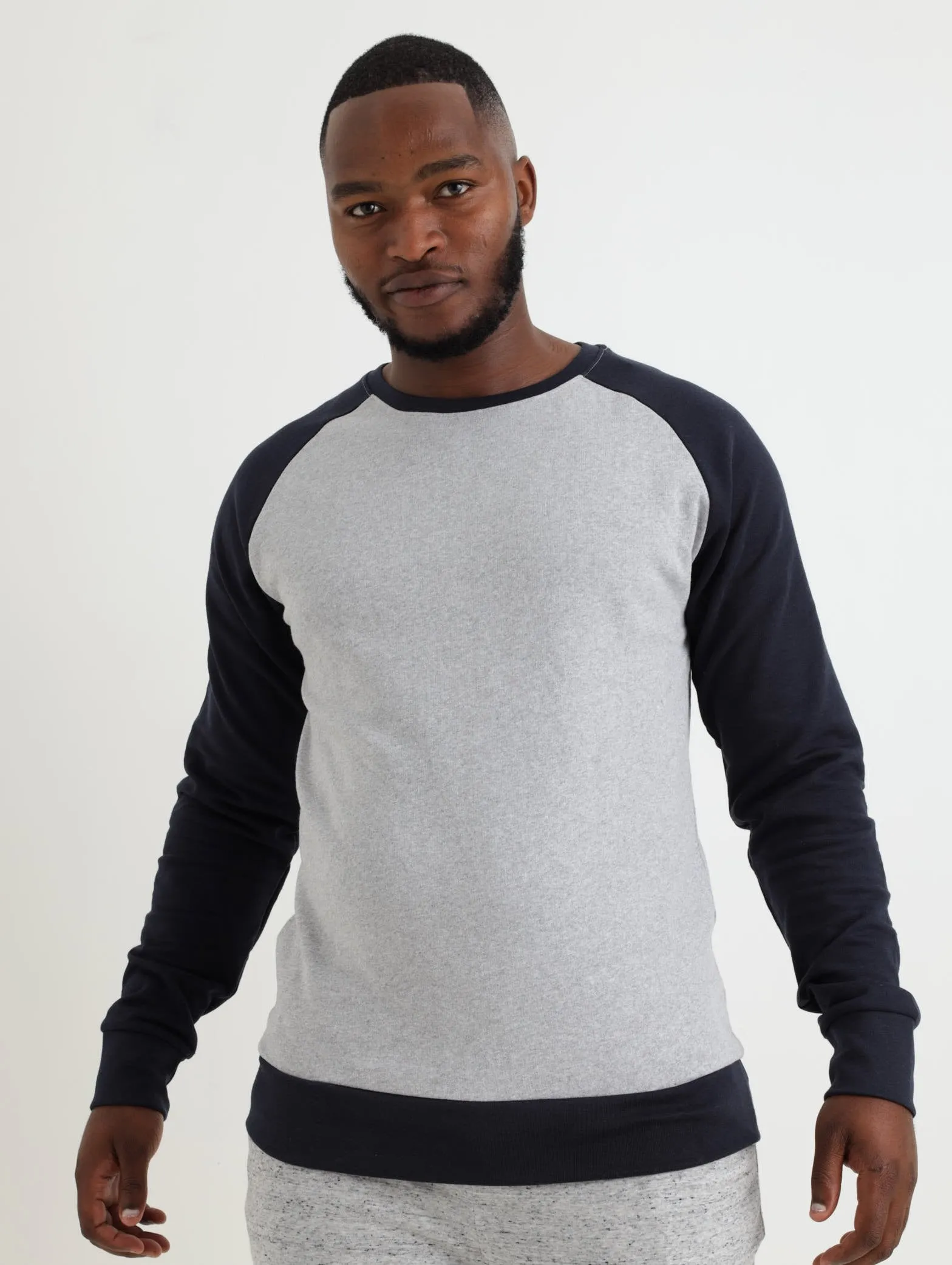 Men's Raglan Crew Fleece Top - Navy/Grey sold by Edgars