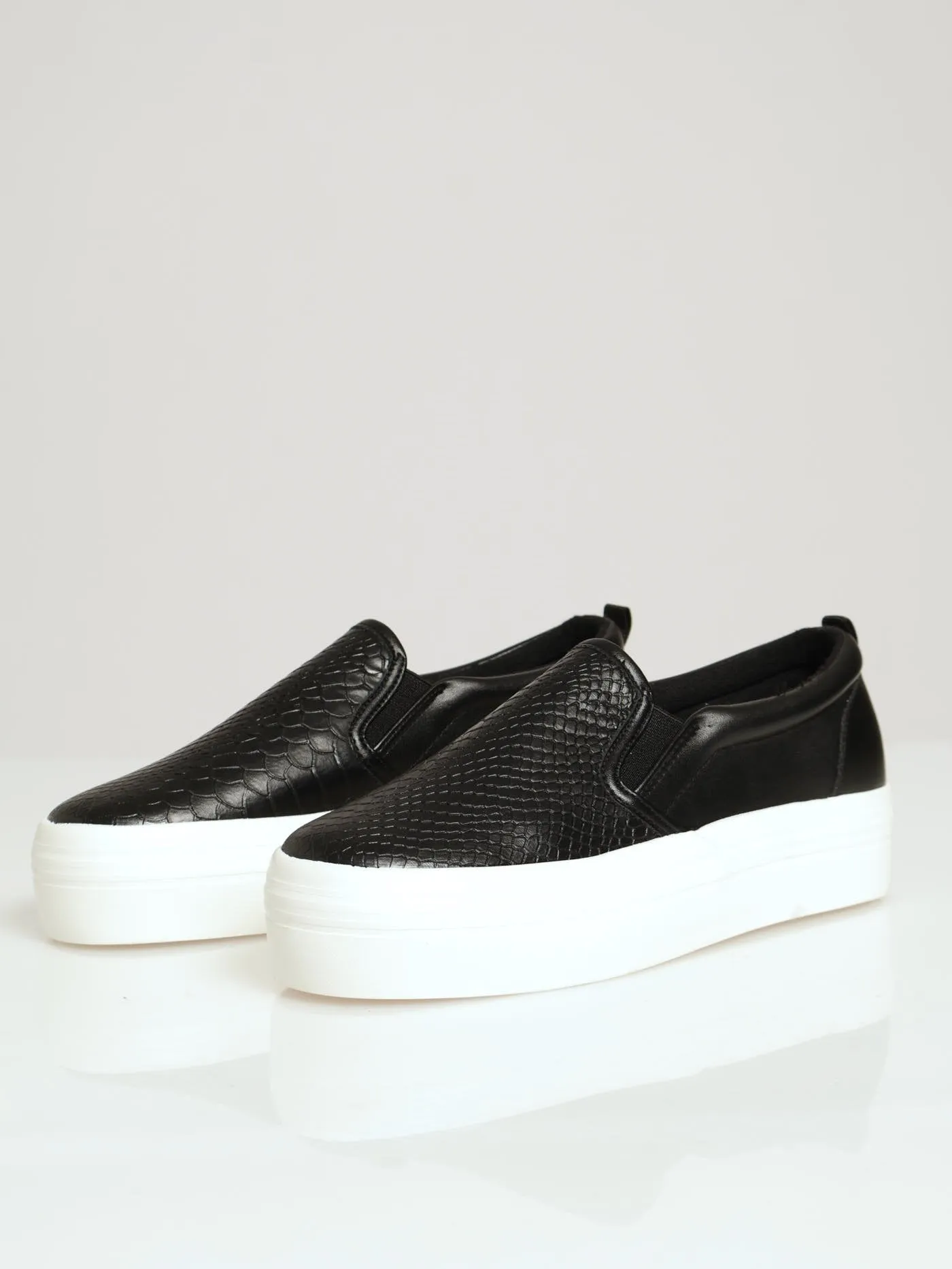 Snake Embossed Platform Slip On Sneaker - Black sold by Edgars