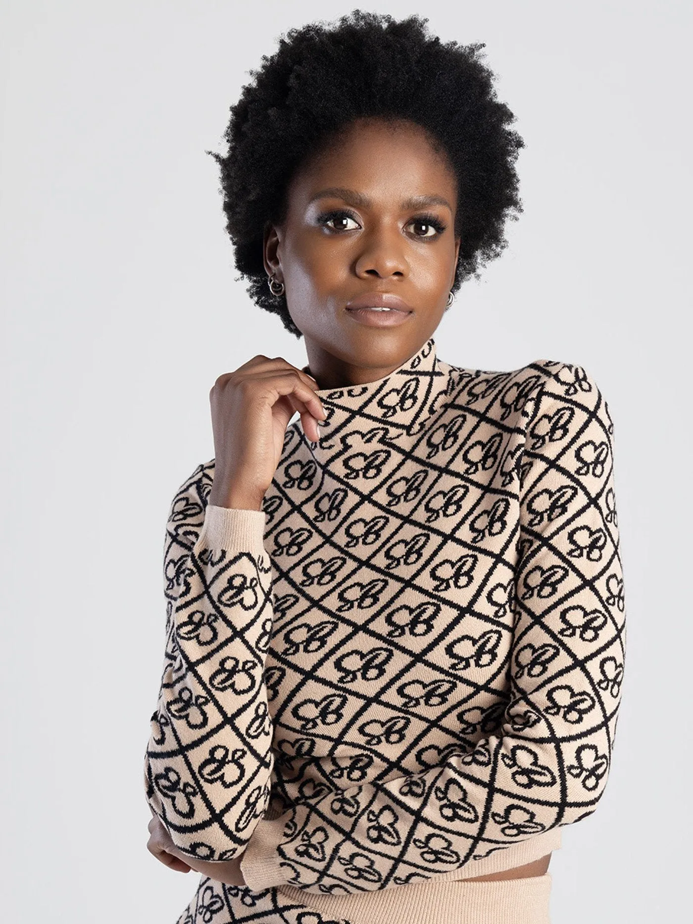 Long Sleeve Knit Turtle-Neck Logo Crop Top - Stone sold by Edgars