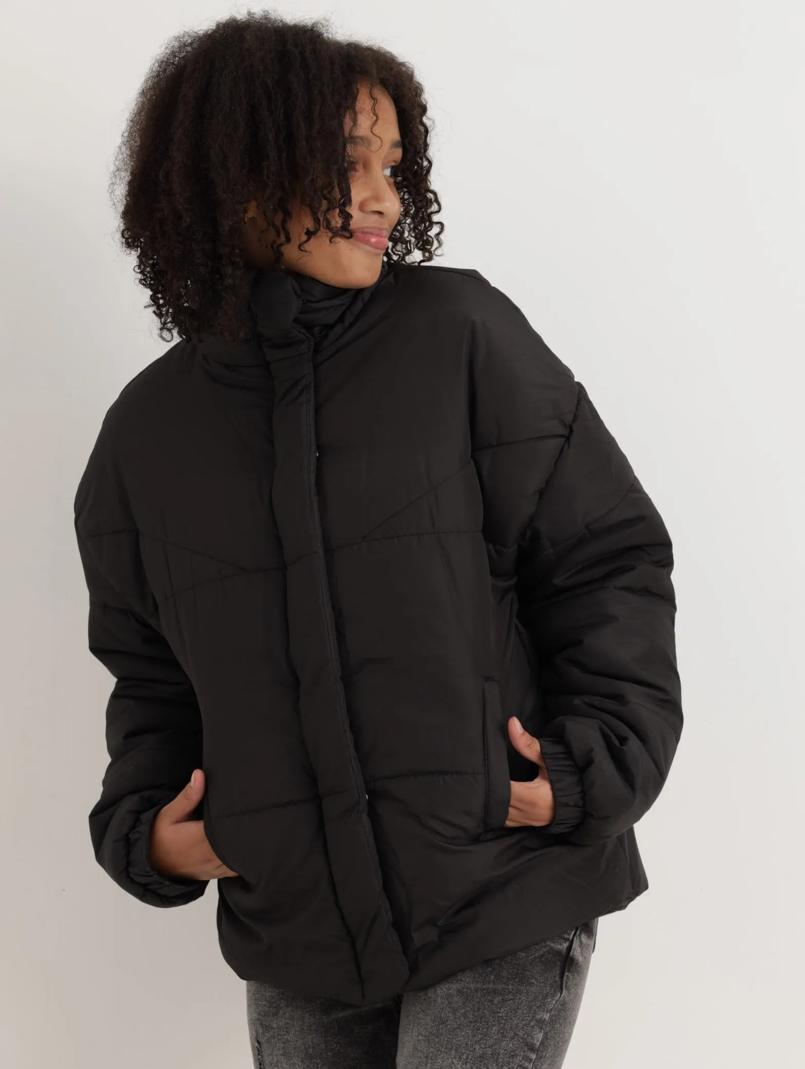 Girls Diagonal Puffer Jacket - Black sold by Edgars