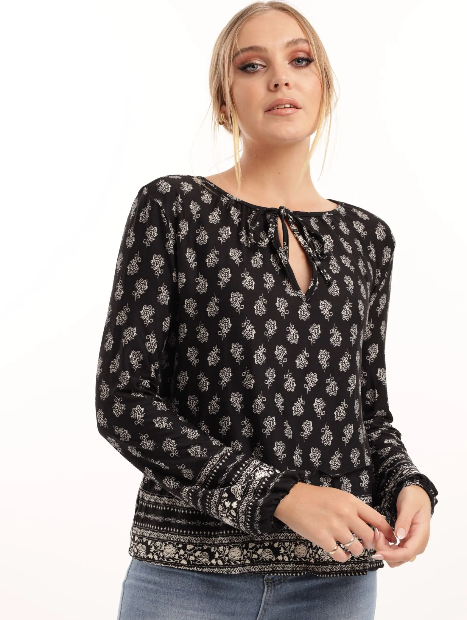 Ladies Knit Peasant Top sold by Edgars