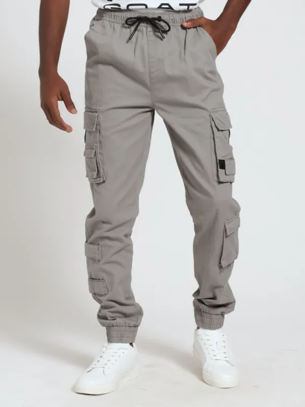 Multi Pocket Cargo Pants - Light Grey sold by Edgars