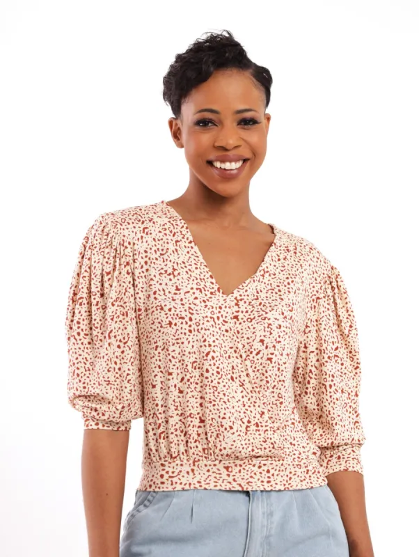 Ladies Animal Print Cross-Over Top sold by Edgars