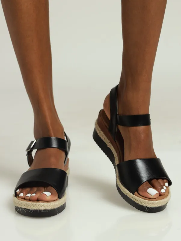 Tammy Ankle Strap Platform Sandal - Black sold by Edgars