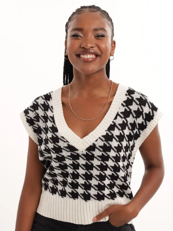 Ladies Houndstooth Sleeveless Pullover - Black sold by Edgars