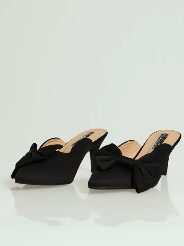Bow Trim Mule Heel - Black sold by Edgars
