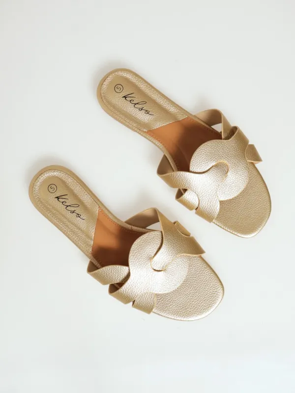 Interlock Strap Pebble Grain Mule Sandal - Gold sold by Edgars