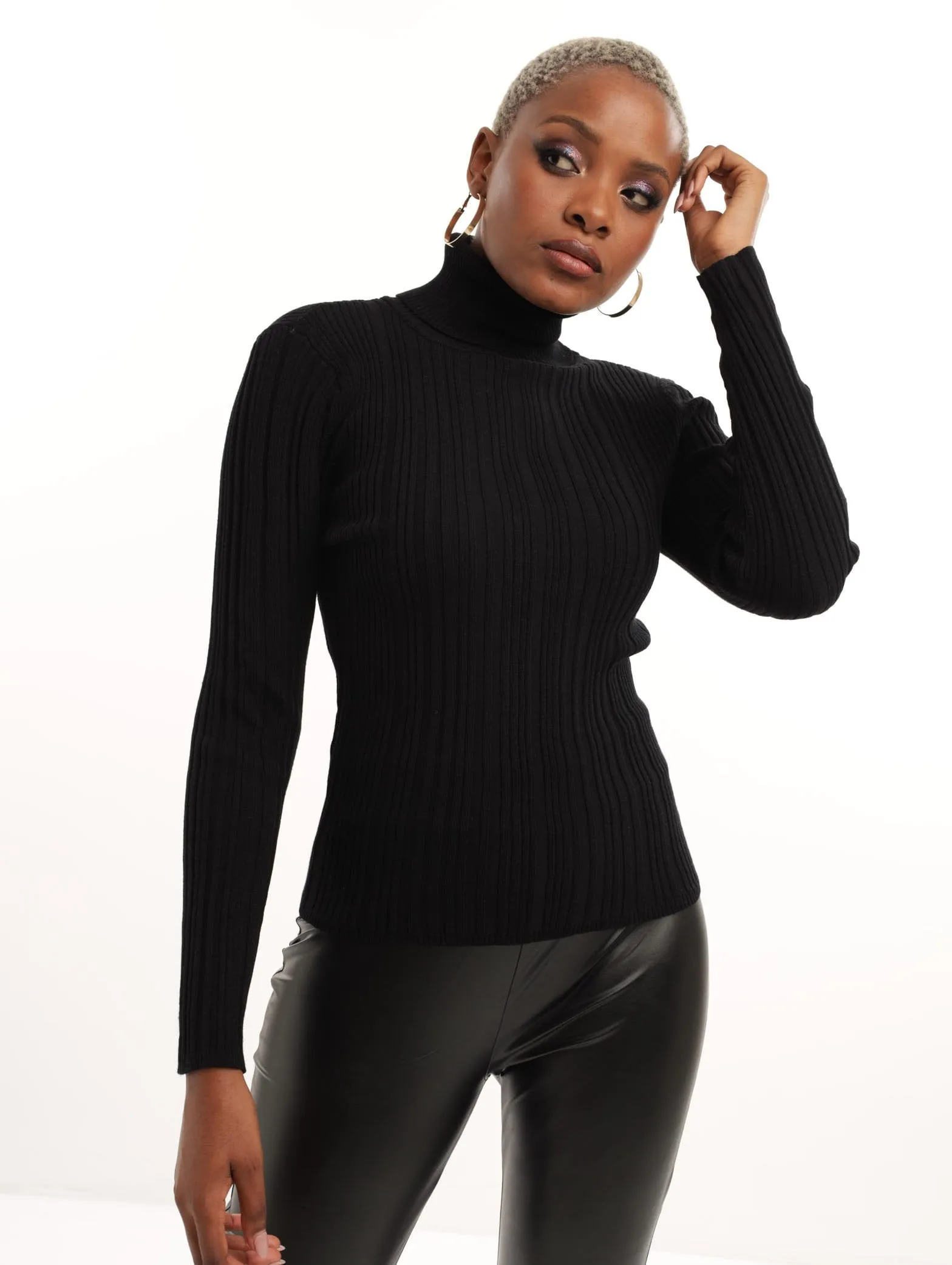 Ladies Poloneck Top - Black sold by Edgars