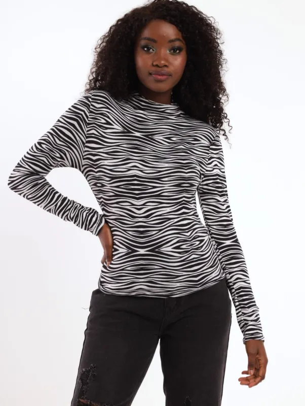 Ladies Long Sleeve Zebra Marble Print Top sold by Edgars