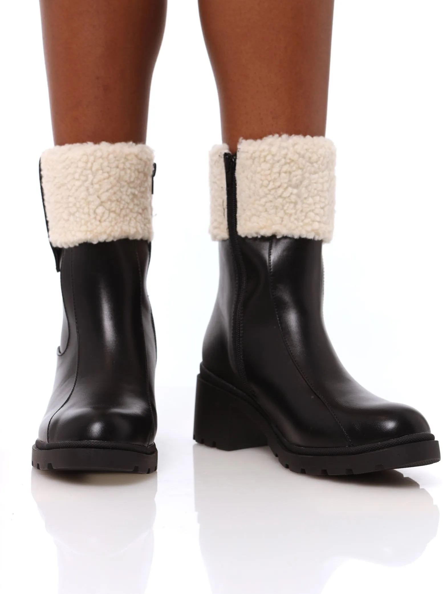 Ladies Cleated Block Heel Boot - Black sold by Edgars