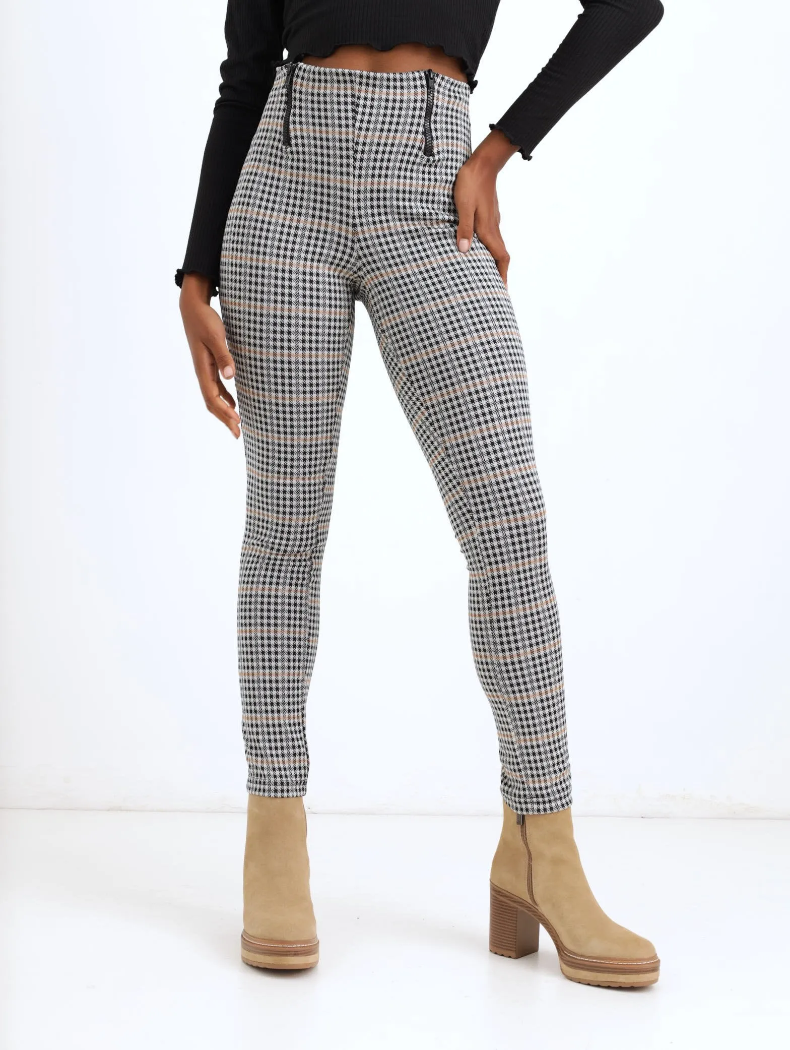 Ladies Zip Detail Check Legging sold by Edgars