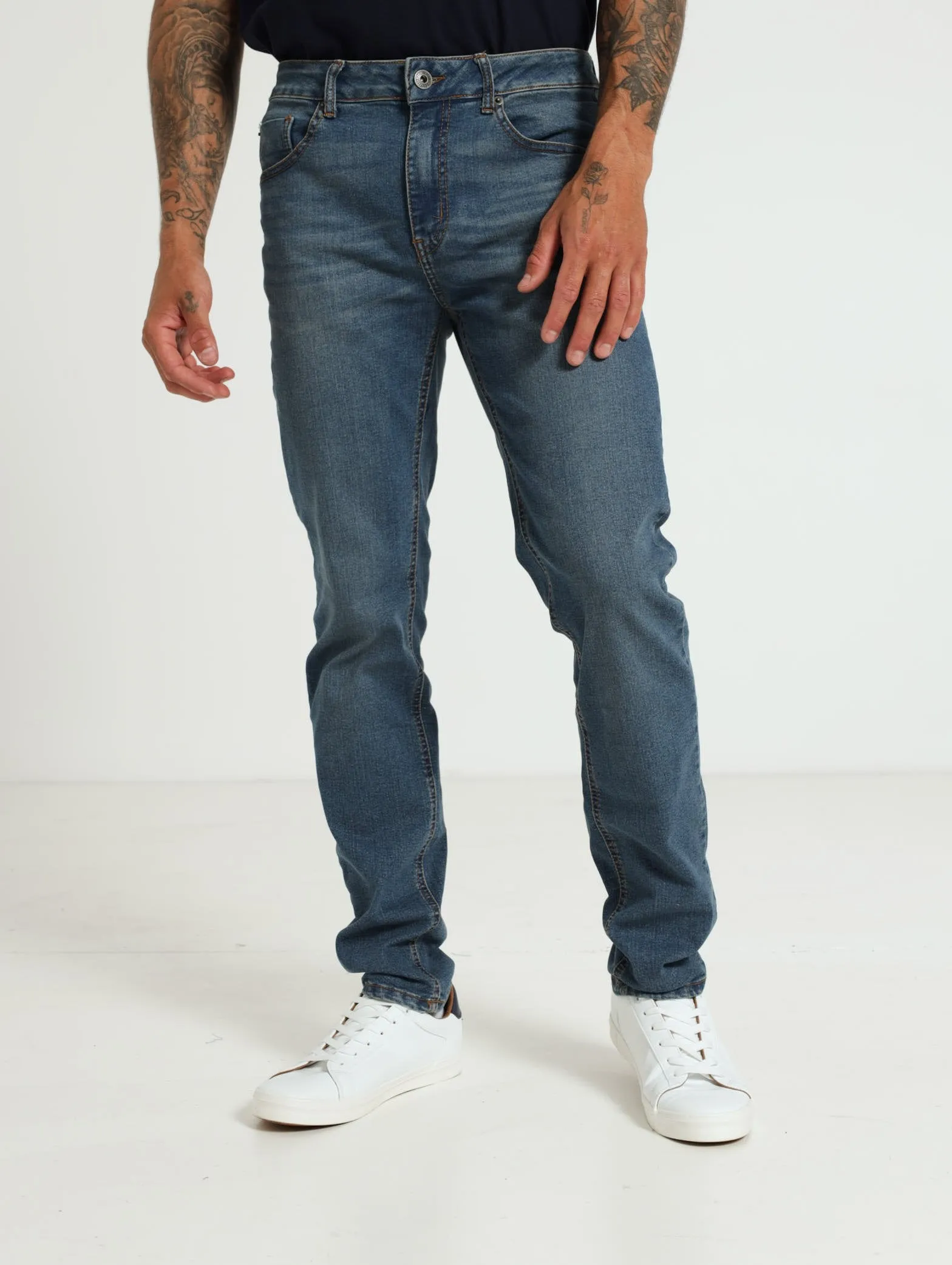 Mid Tint Skinny Jean - Medium Wash sold by Edgars