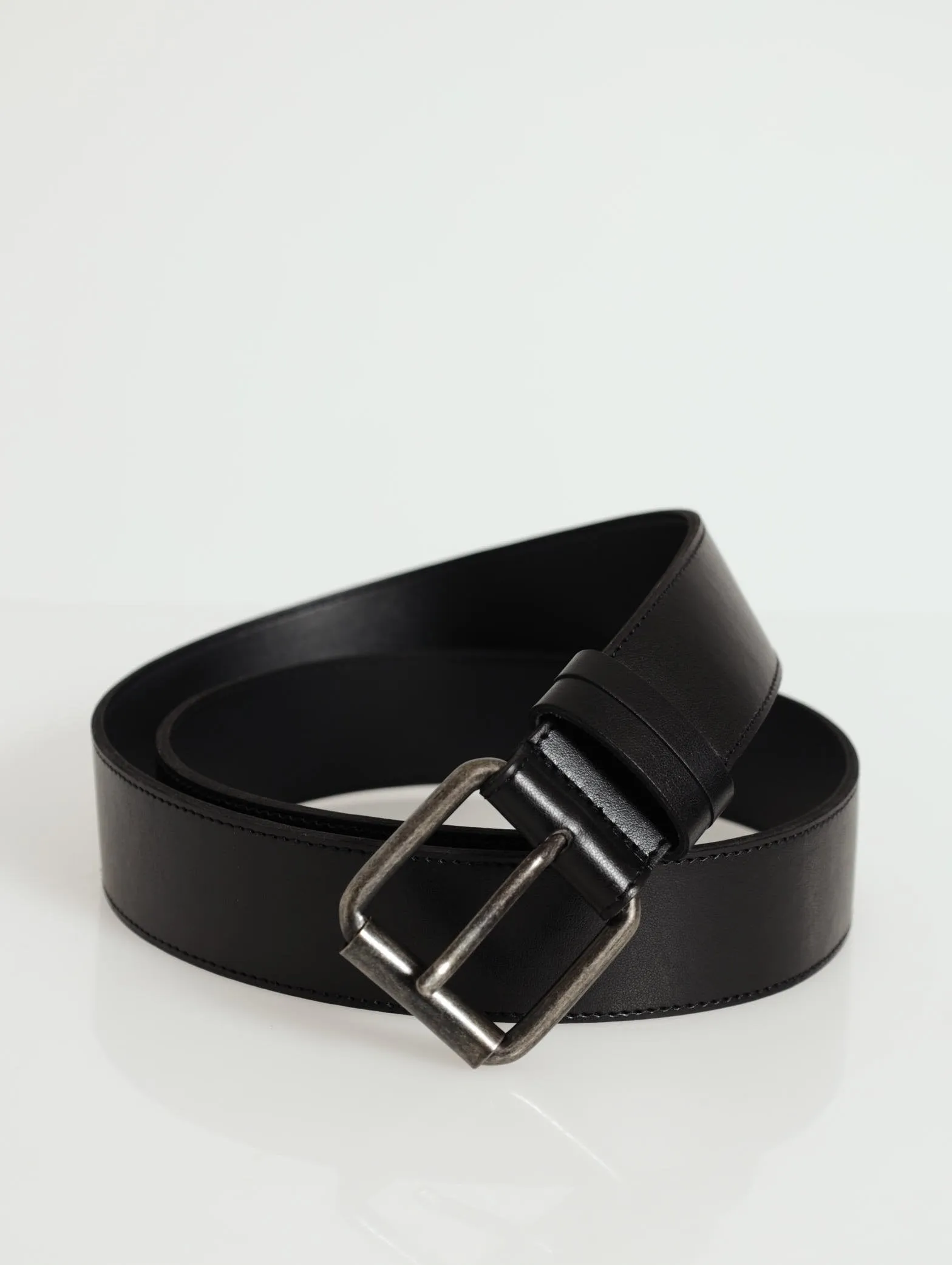 Roller Buckle Belt - Black sold by Edgars