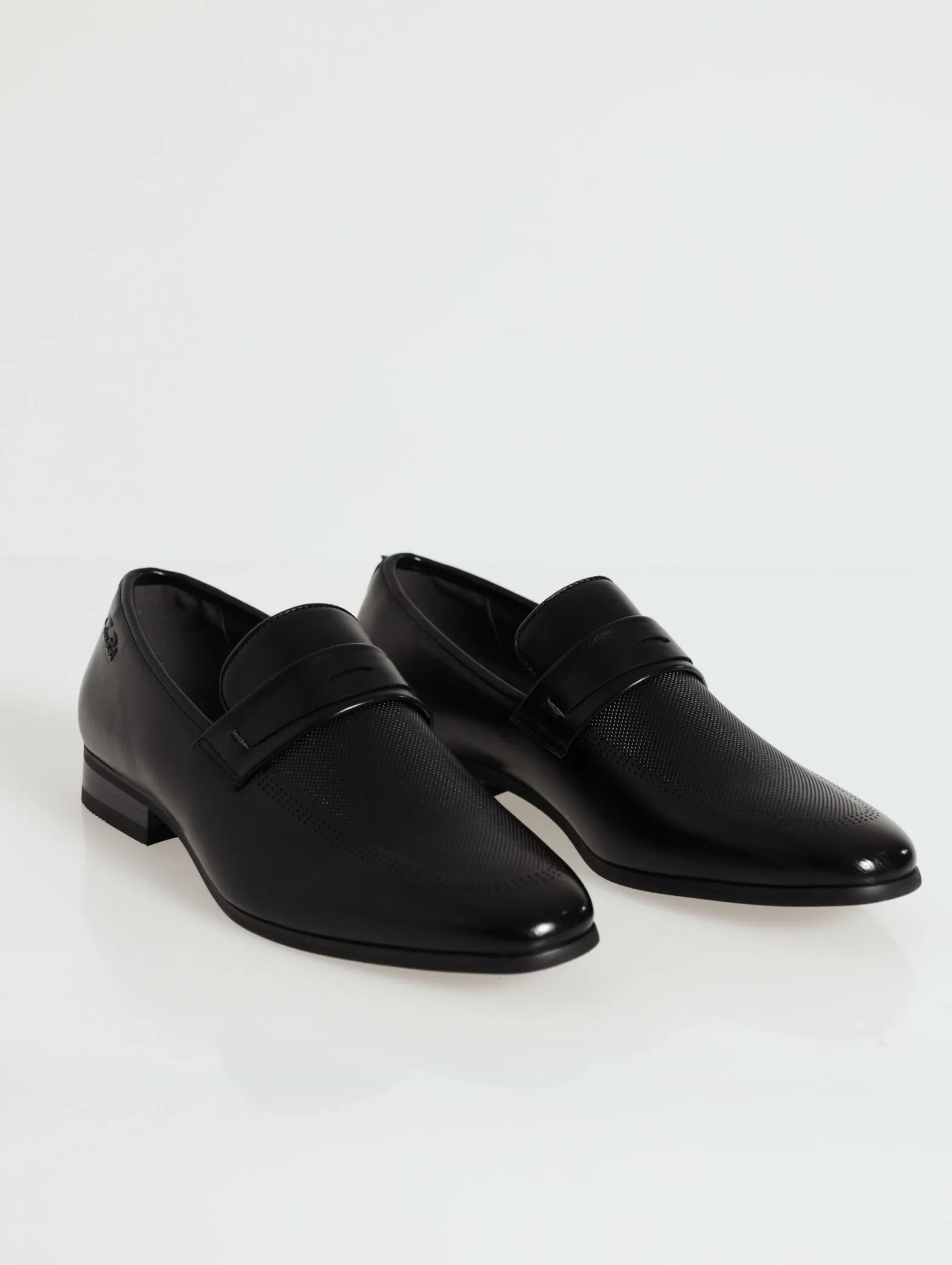 Slip On With Pin Punched Vamp - Black sold by Edgars