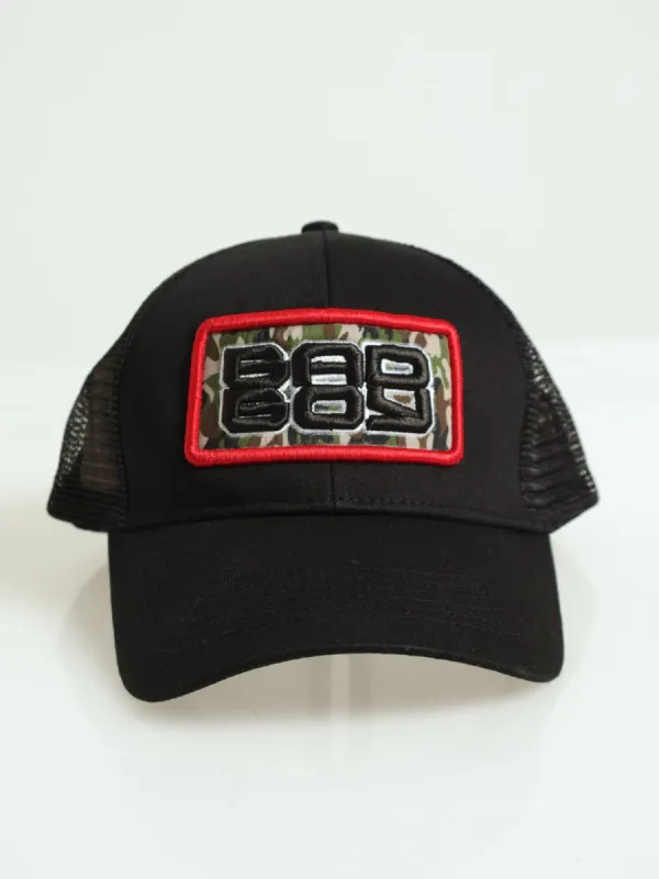 Curved Twill Trucker With Badge & Mesh Back - Black sold by Edgars