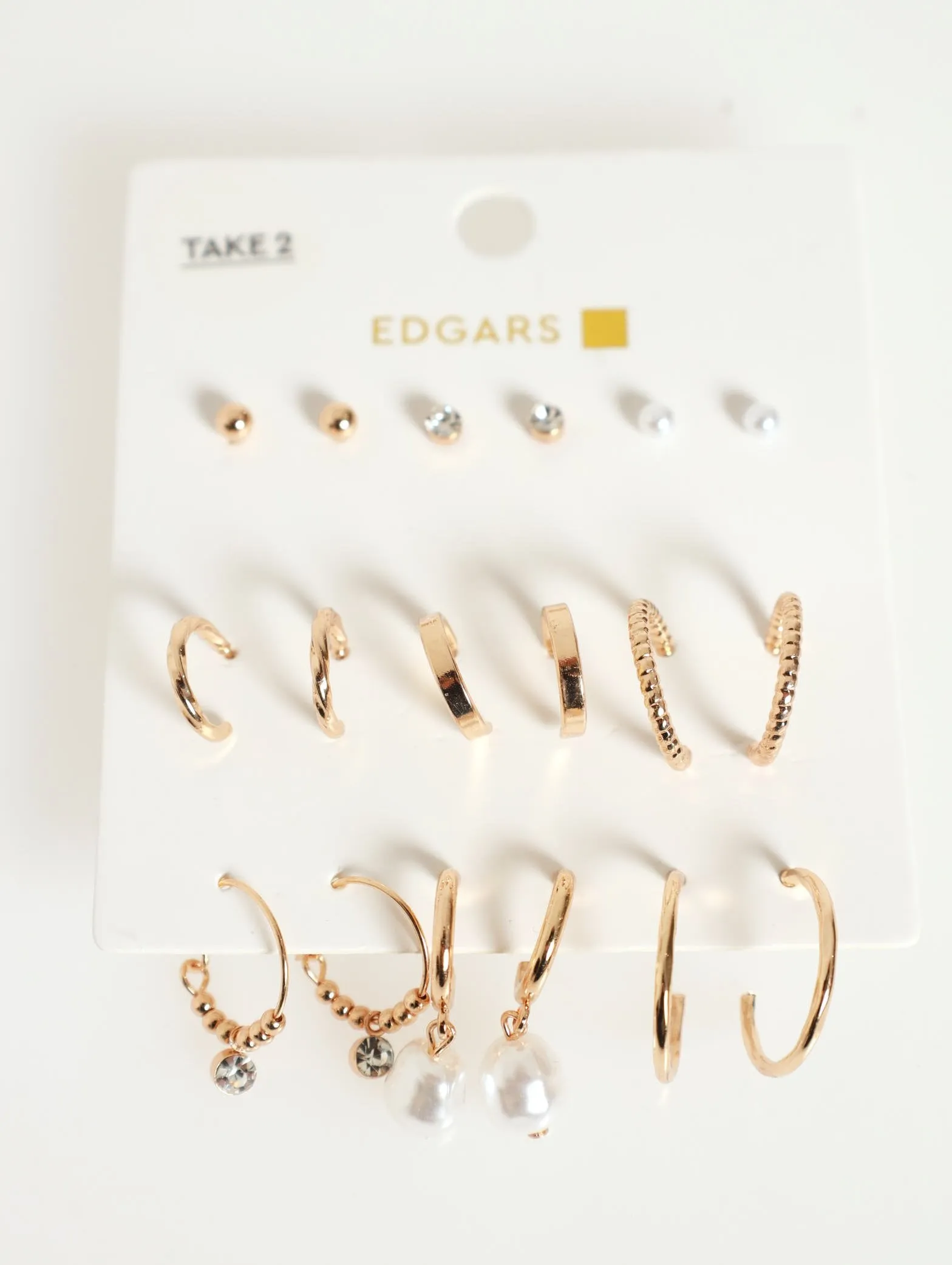 9 Pack Small Hoops & Studs Earrings - Gold sold by Edgars