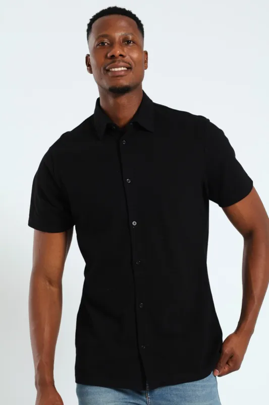 Button Through Mini Waffle Weave Shirt - Black sold by Edgars