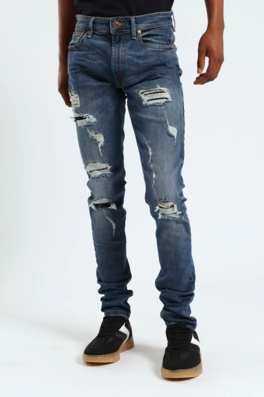 Patch Rip & Repair Super Skinny Jean - Denim sold by Edgars