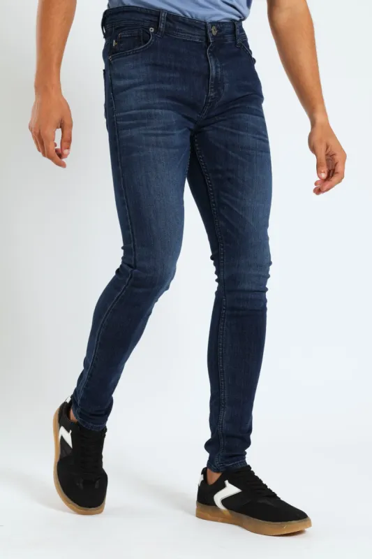 Ripped & Repair Super Skinny Jean - Mid Blue sold by Edgars