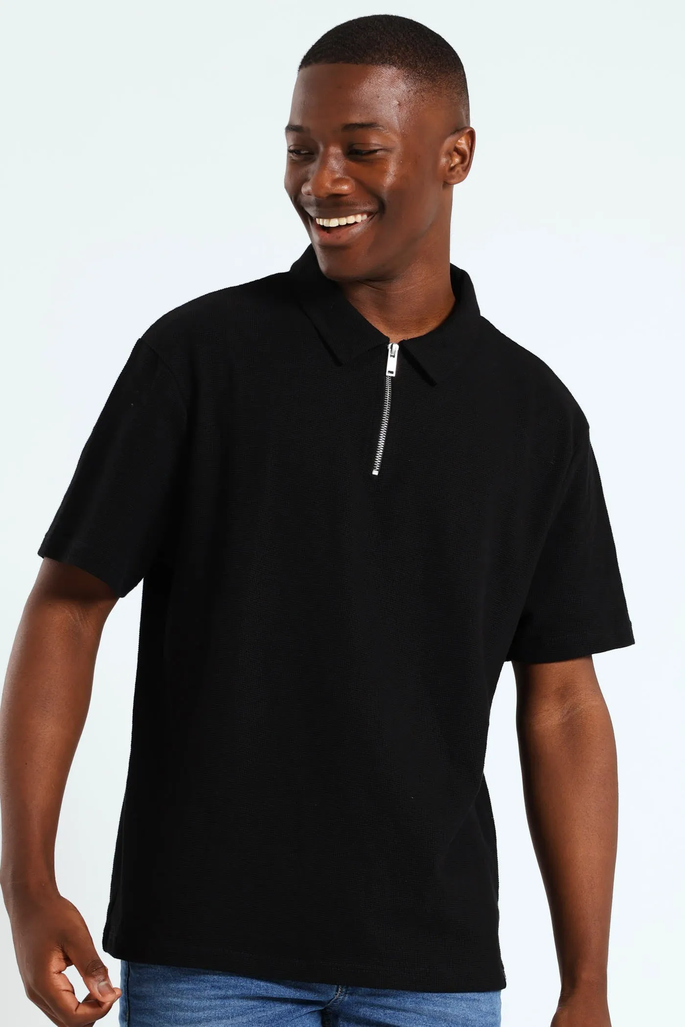 Stitch Waffle Zip Golfer - Black sold by Edgars
