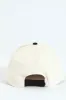 Side Label Cap - Cream sold by Edgars