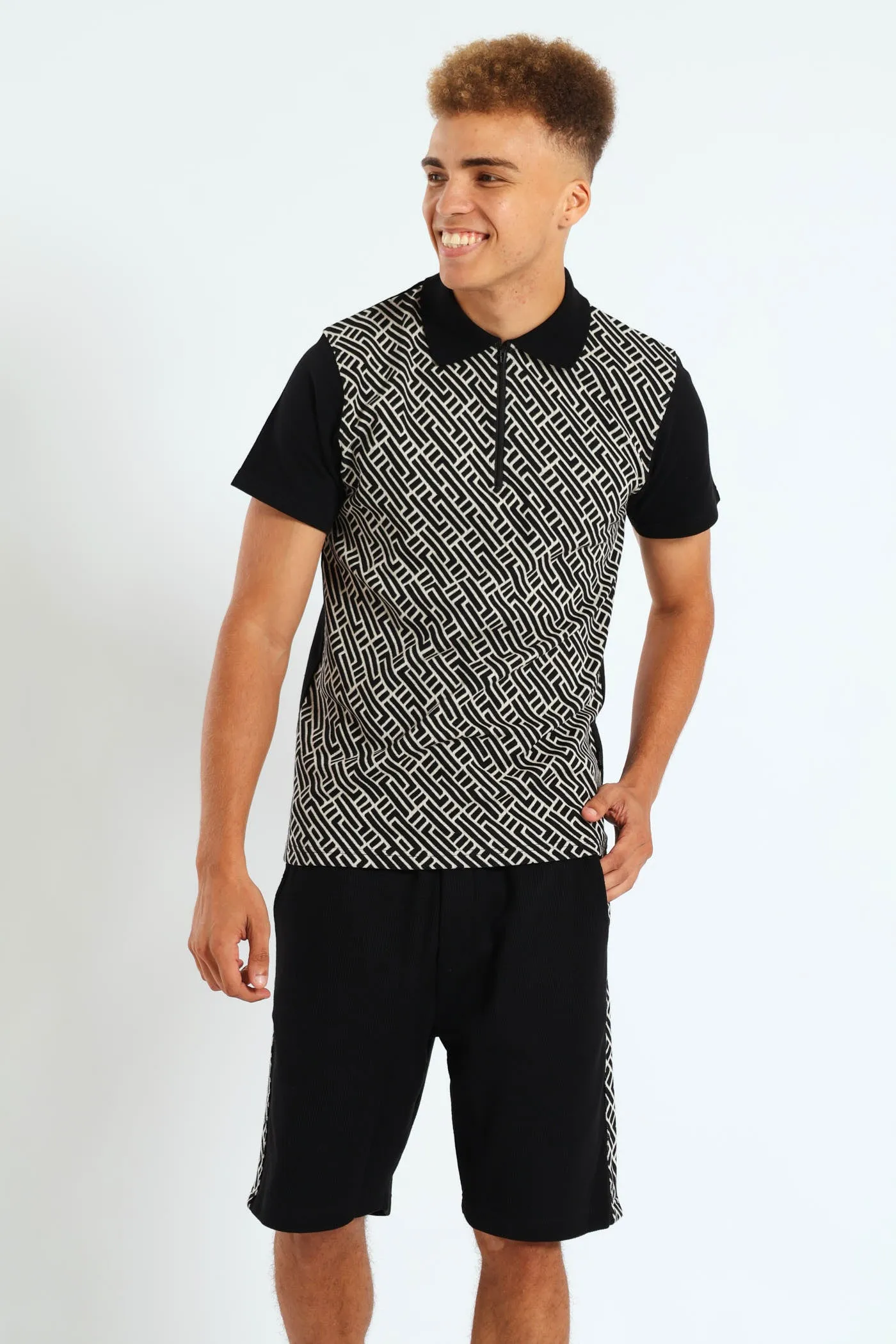 Zip Jacquard Golfer - Black sold by Edgars