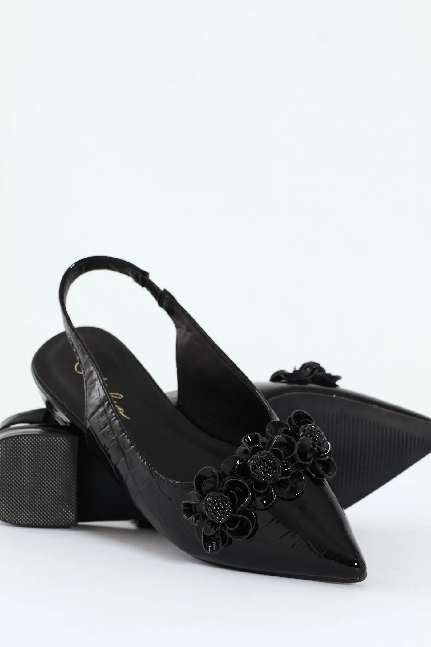Pointy Croc Sling Back With Flowers - Black sold by Edgars