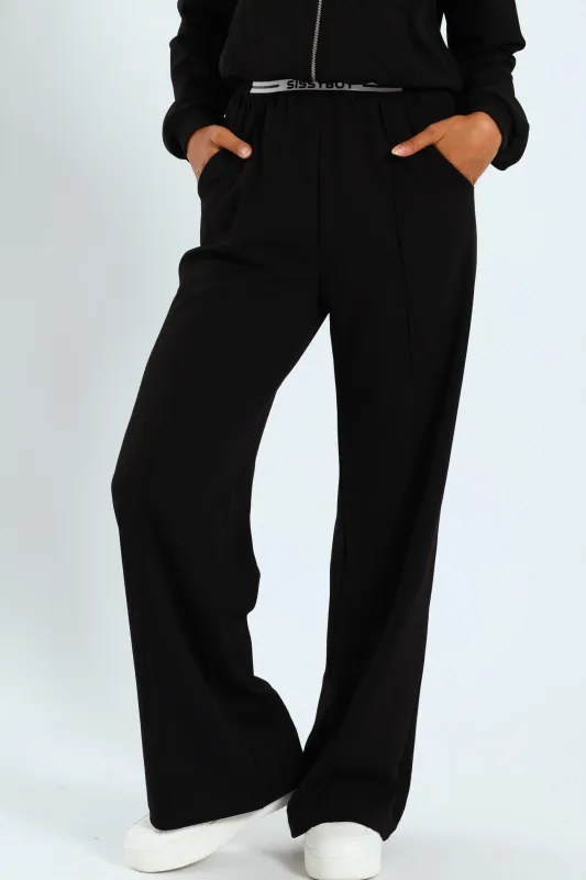 Sporty Wide Leg Track Pants - Black sold by Edgars