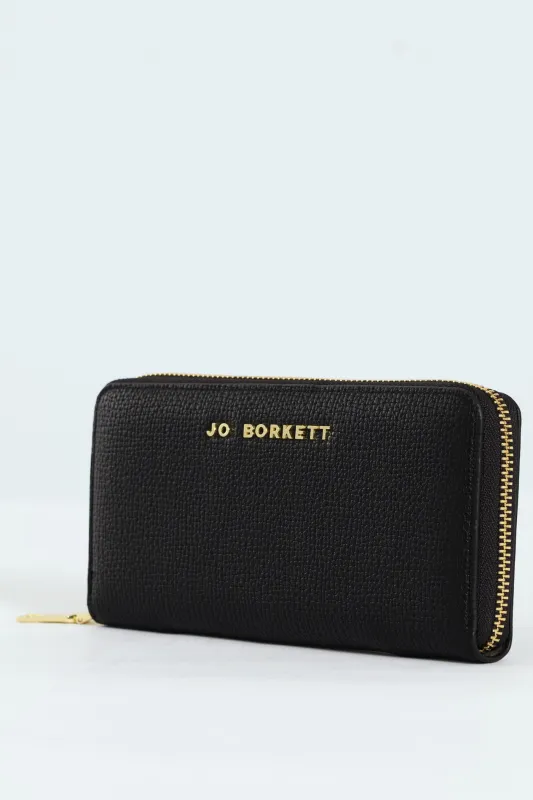 Carrie Pebble Raised Logo Ziparound Purse - Black sold by Edgars