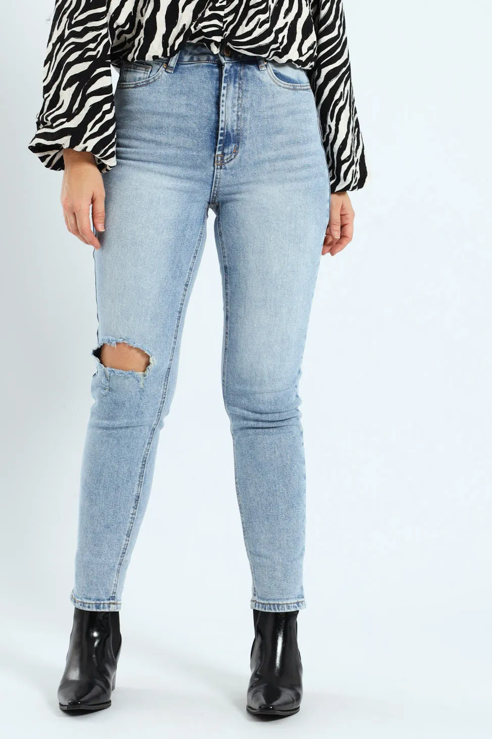 Rip Knee Mom Jean - Light Wash sold by Edgars