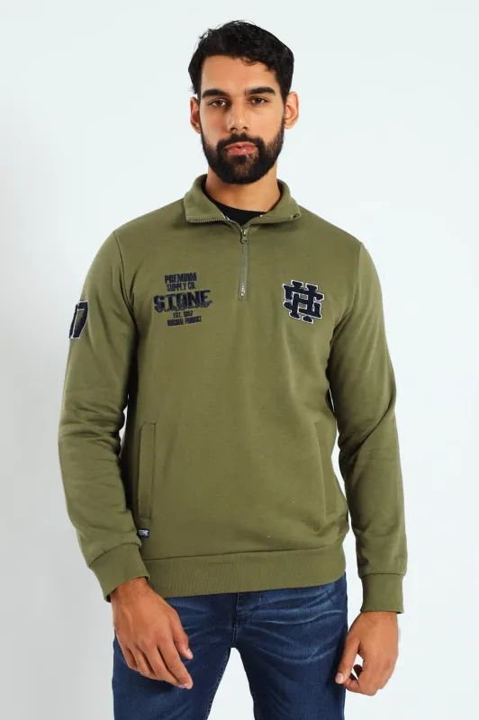 Quarter Zip Badge Sweat Top - Fatigue sold by Edgars