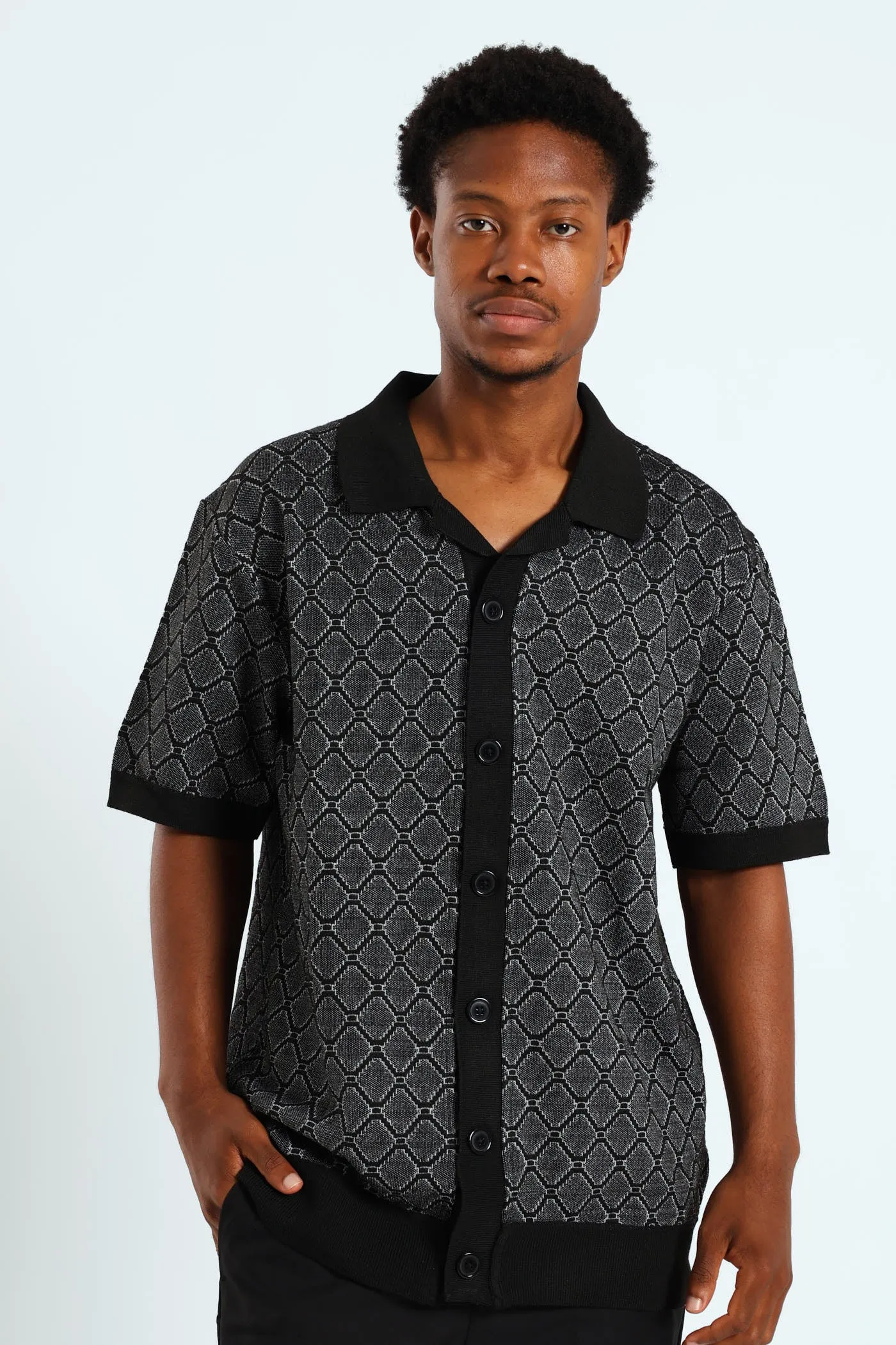 Short Sleeve Button Through Knit Shirt - Black/White sold by Edgars