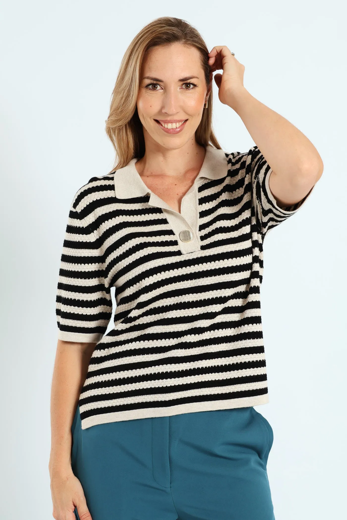 Monochrome Golfer - Brown sold by Edgars