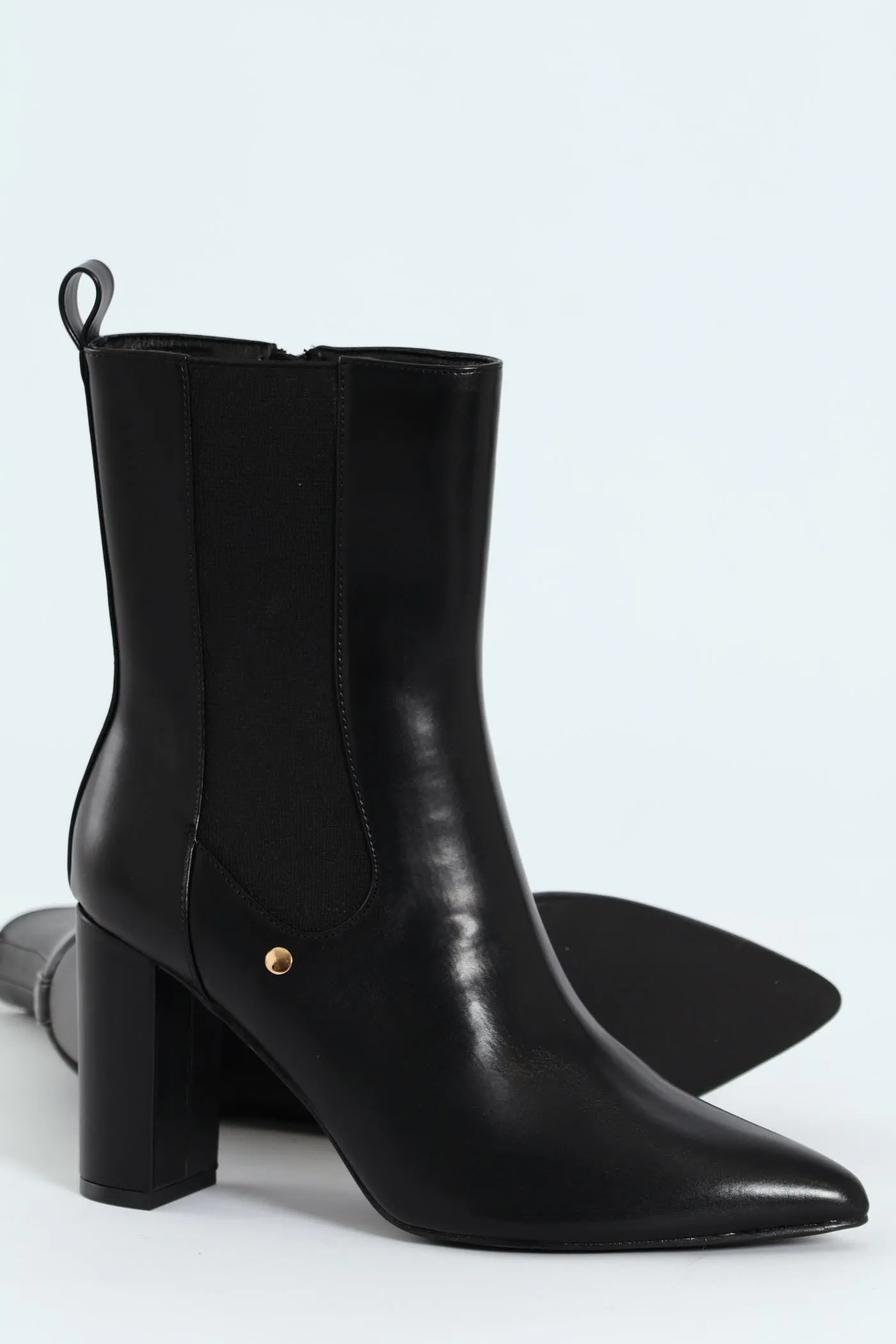 Zip-Up Heel Boot - Black sold by Edgars