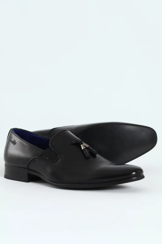 Tassle Slip On - Black sold by Edgars