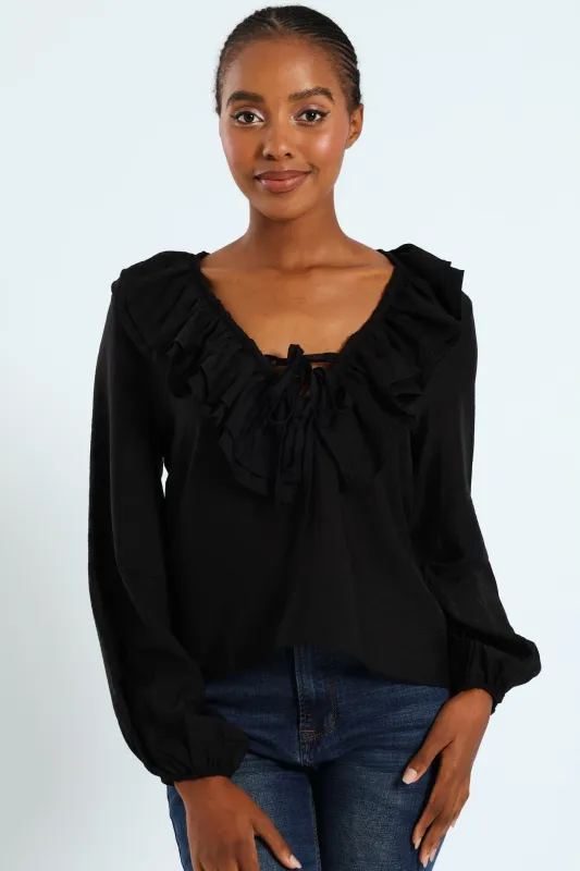 Ruffle Romatic Blouse With Lace Up Ties - Black sold by Edgars